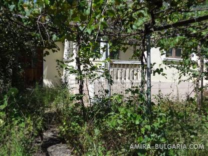 Old bulgarian house in a well served village garden