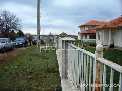 New house near a golf course fence