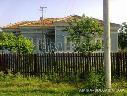 House in Bulgaria near a dam front 3